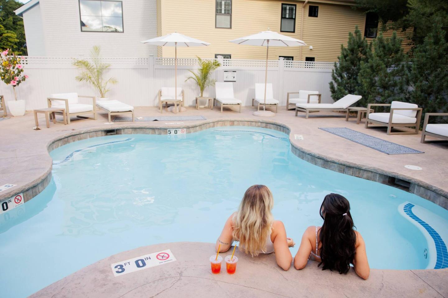 Two people in a pool