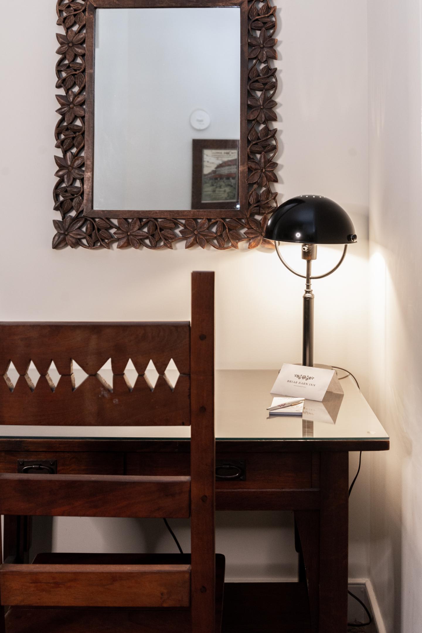 A close up of a hotel room desk