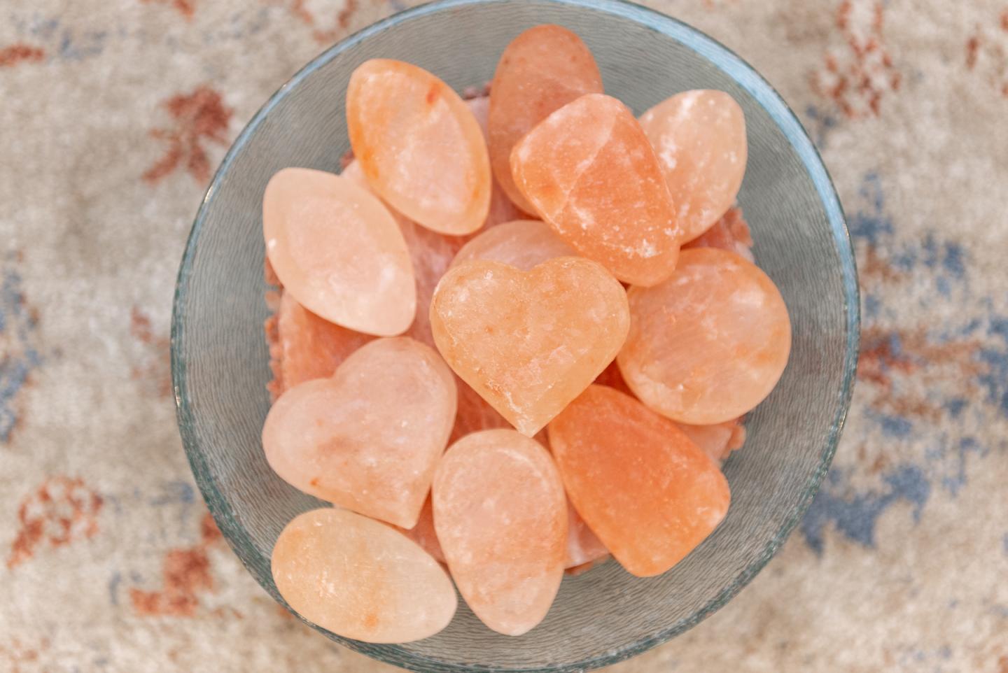 A close up of a bowl of stones