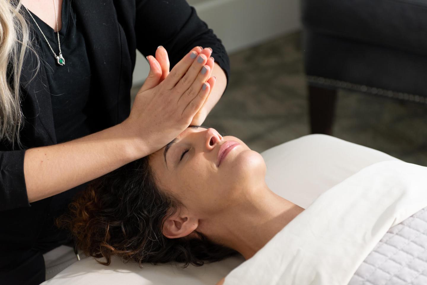 A person getting a face massage