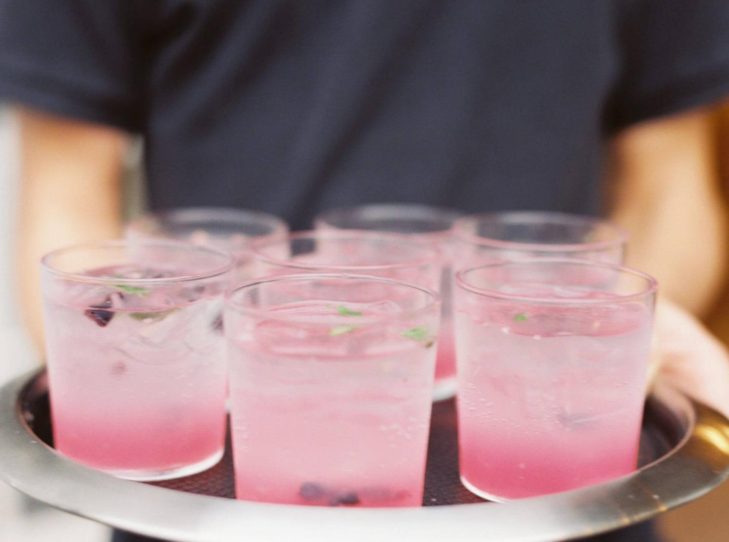 Pink cocktails on a tray