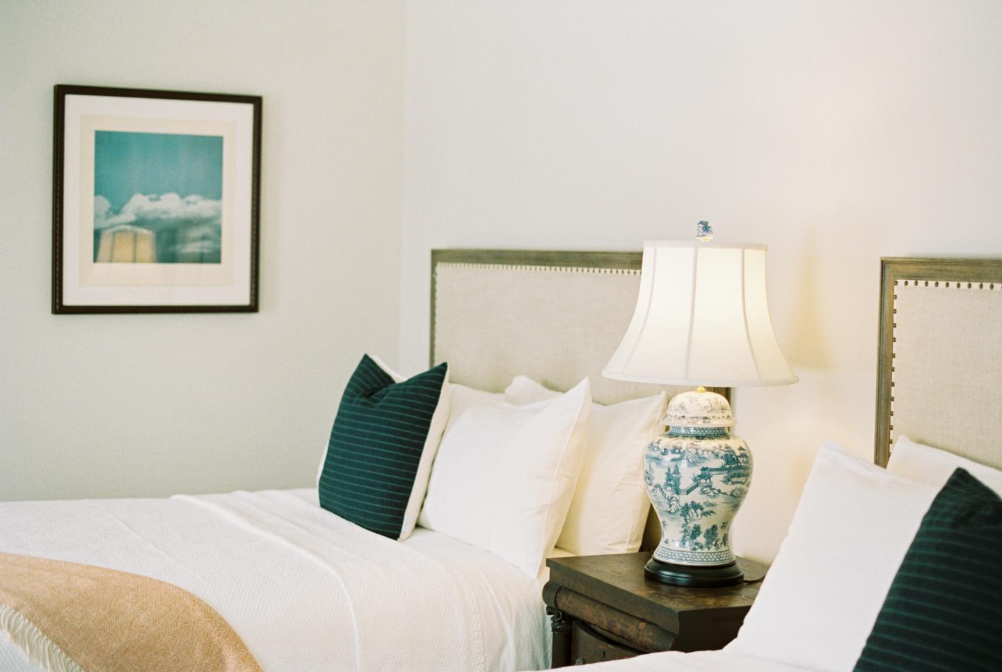 A close up of hotel beds
