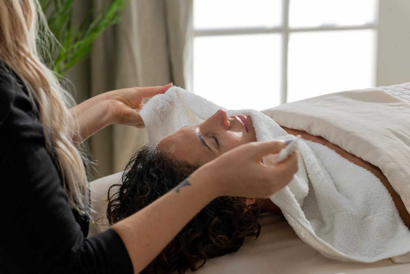 A person getting a spa facial