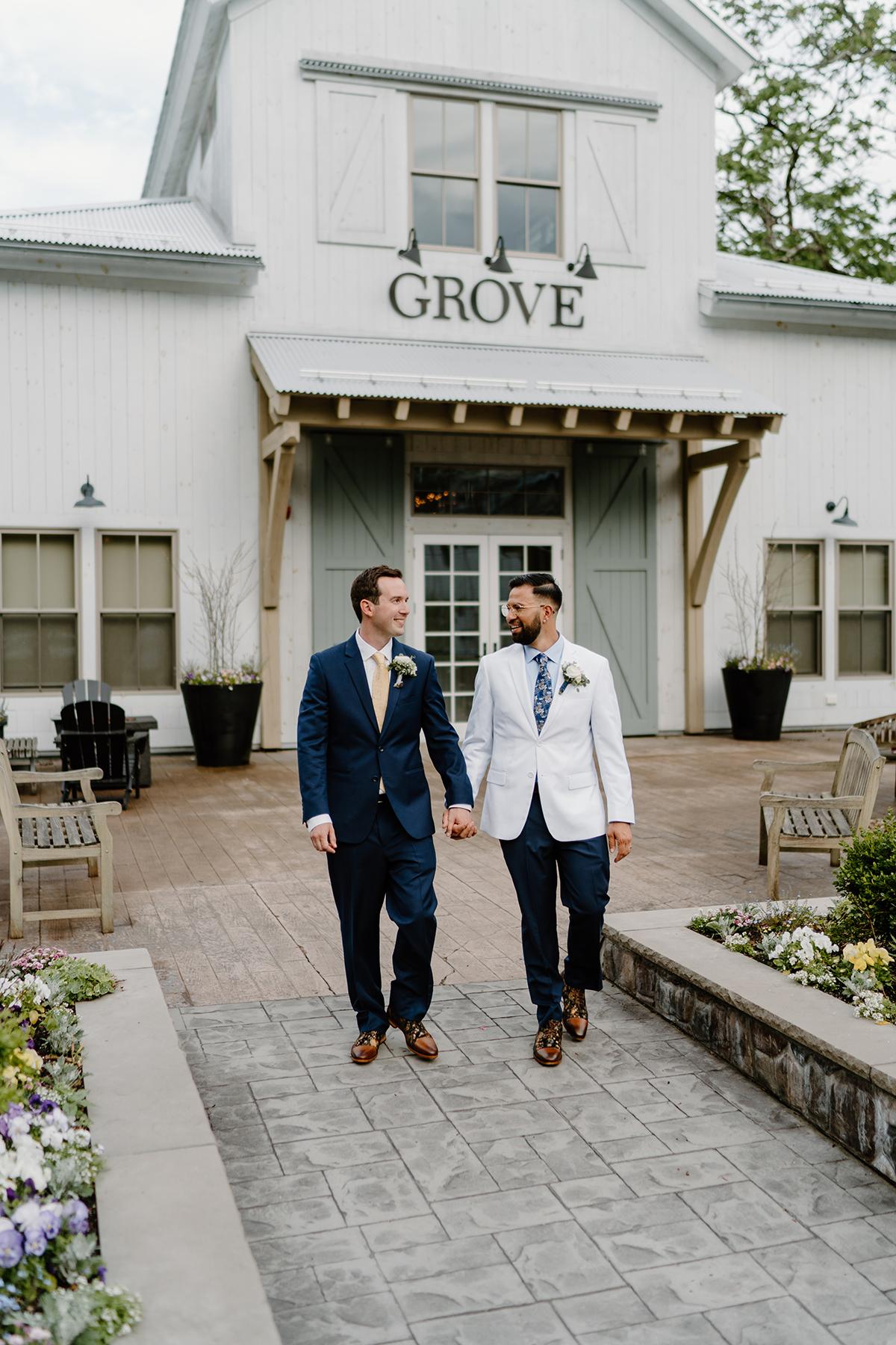 couple in front of grove
