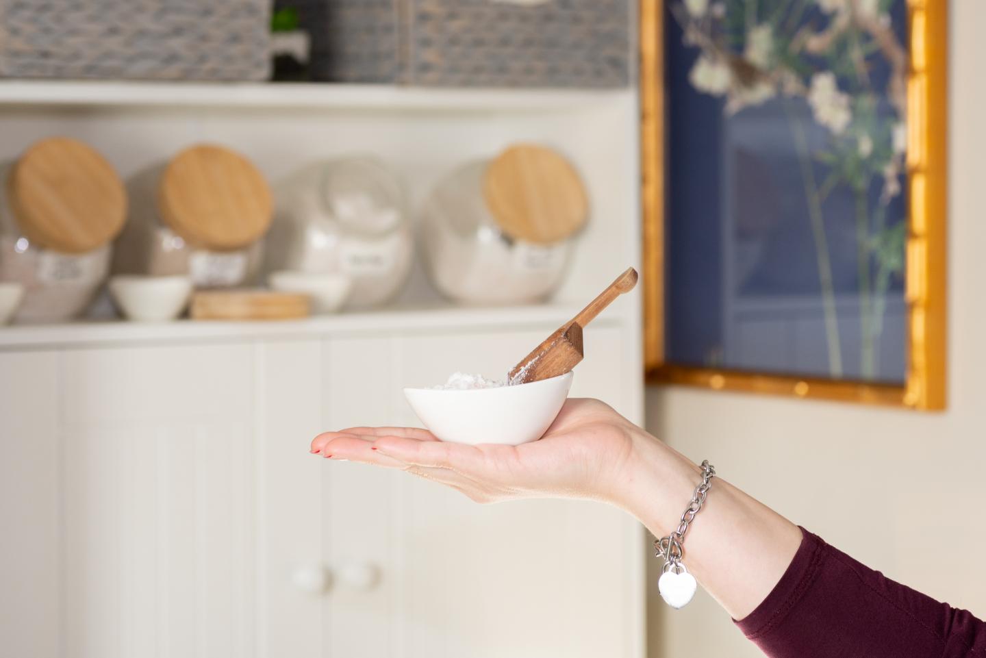 Spa soaking salts being held up