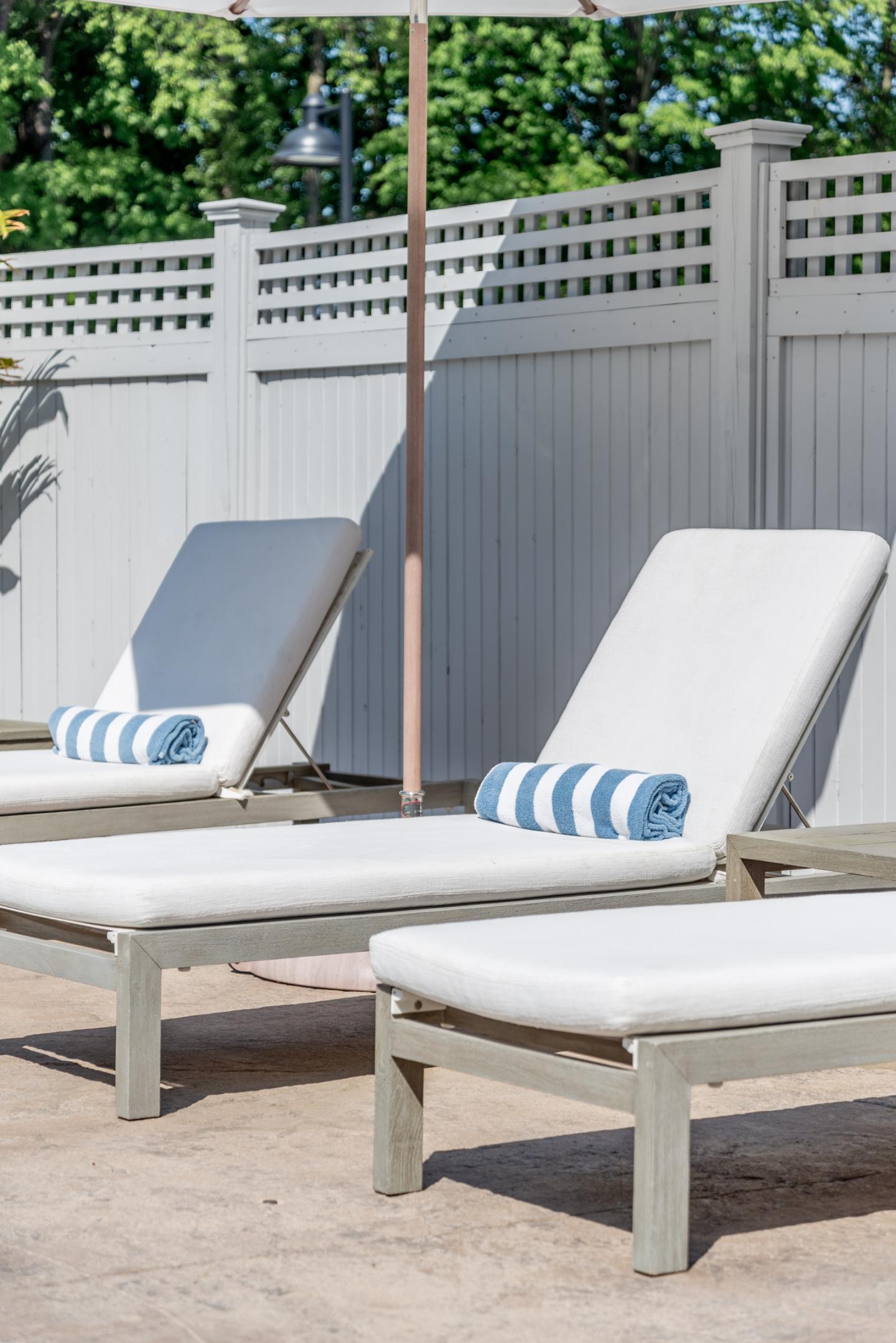 pool chairs and towels